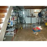 A Flooded basement causes loss of personal property, mold treat and clean up takes hours